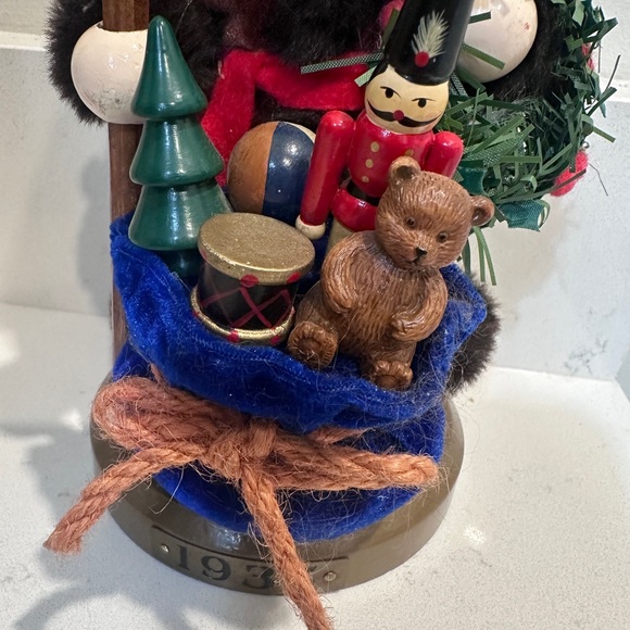 Festive Santa Nutcracker with Wreath and Gifts